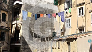 Line-Dried Colored Laundry Waving on the Rope.