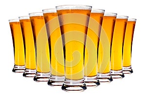 Line of glasses with lager beer