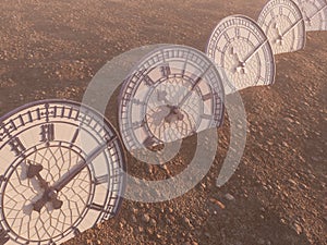 A line of half buried antique clocks