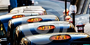Line of London Taxi Cabs
