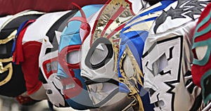 A Line of Lucha Libre Luchador Masks photo