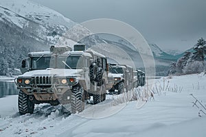 Line of military trucks on a snowy road at dusk