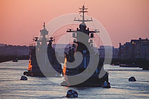 A line of modern russian military naval battleships warships in the row, northern fleet and baltic sea fleet in the open sea