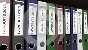 Line of multicolor office binders with Lawsuits tags different years 3D rendering