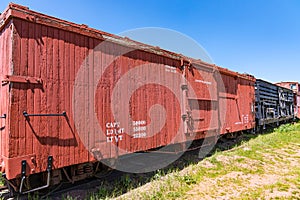 Line of old railroad boxcars