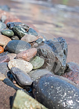 Line of pebble stones at the beach