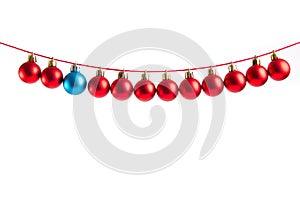 Line of red and blue christmas balls on white background. Christmas decorations.