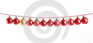 Line of red christmas balls on white background. Christmas decorations