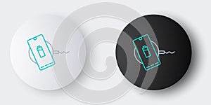 Line Smartphone charging on wireless charger icon isolated on grey background. Charging battery on charging pad