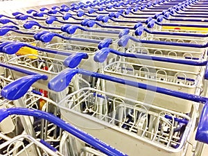 Line stack of trolleys in the airport