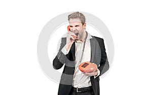 Line telephony. Angry man shout in telephone receiver. Businessman is on landline telephone. Retro connection. Olf