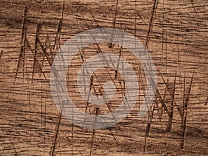 Line and texture on brown wooden background.