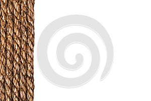 Line of a twisted decorational linen rope string isolated on white background. Empty space. Copy space
