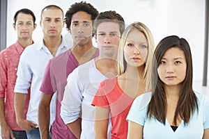 Line Of Young Business People In Casual Dress