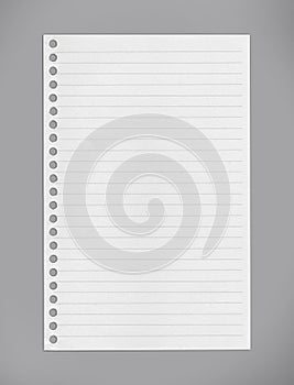 Lined notebook paper on gray background/clipping paths