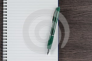 Lined notebook and pen, checklist memo reminder memorandum