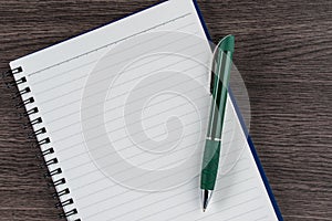 Lined notebook and pen, checklist memo reminder memorandum