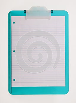 Lined paper on clipboard