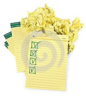 Lined paper notebooks with completed checklist