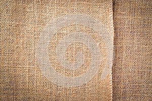 Linen background. Natural organic beige canvas. Brown woven Backdrop. Linen weave Material cotton background