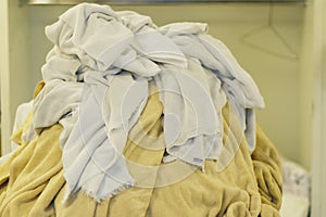 Linen room with full of soiled bath towels