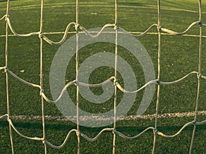 Lines around football field, corner side, synthetic lawn