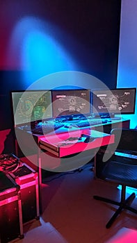 Lines of code running on computer screens in data center