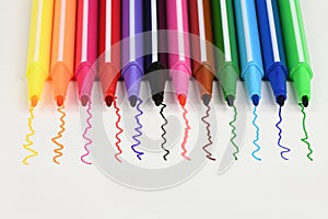 Lines drawn with colored markers isolated on a white background. Extreme closeup