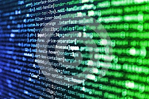 Lines of Html code visible. Coding programmer abstract background. Software developer programming code on computer. HTML CSS3