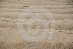 Lines and ripples through the sand on a beach