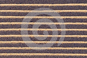 Lines in the sand on the beach, background texture