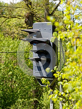 German railway signal on mounted post in forest