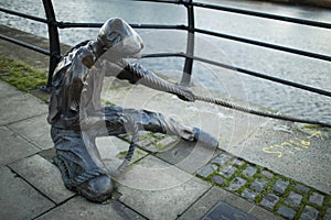 The Linesman statue at Liffey river.