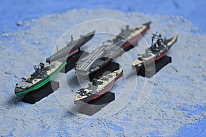 The lineup of miniature battleships consists of the enterprise carrier and others