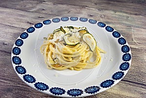 Linguine alla Nerano with fried zucchini and provolone cheese from Monaco