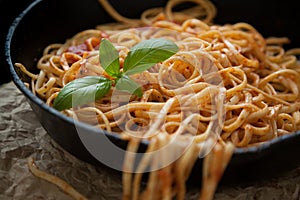 Linguine with Basil and Red Sauce in Cast Iron Pan