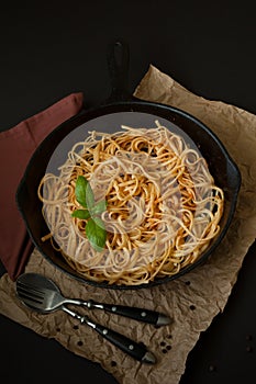 Linguine with Basil and Red Sauce in Cast Iron Pan