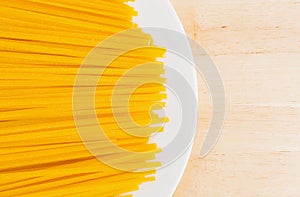 Linguine corn pasta on white plate