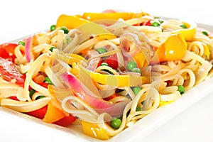 Linguine pasta with vegetables angle upclose