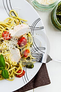 Linguine Pesto with Parmesan, Lemon Chicken, and baked baby plum