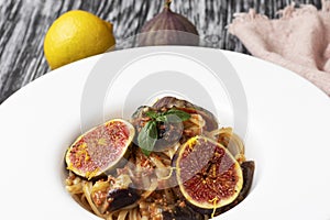 Linguine (spaghetti) with bottarga and figs.