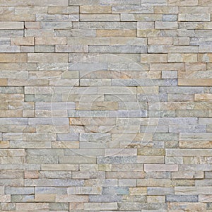 The lining on the wall imitation of natural stone for the facade