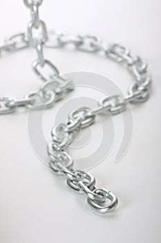 Links of chain on a white background