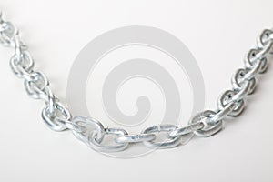 Links of chain on a white background