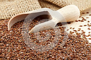 Linseed with wooden scoop