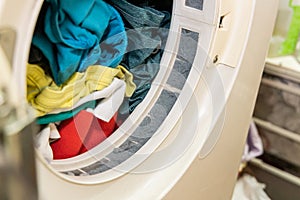 Lint trapped in filter of laundry dryer machine after drying