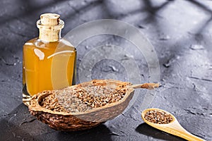 Linum usitatissimum - Organic flaxseed oil, seeds in the bowl
