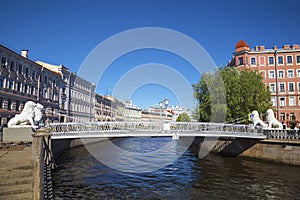 Lion bridge over Griboyedov canal in St. Petersburg,