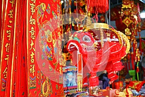 Lion dance. Small lion dance hanging for display in China Town. Chinese character means Happy Chinese New Year, Have a good