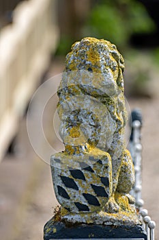 Lion decoration, Rural Dutch landscape with traditional village houses, gardens and farms in Gelderland